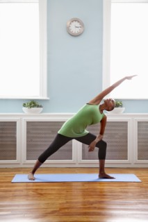 Black woman practicing yoga