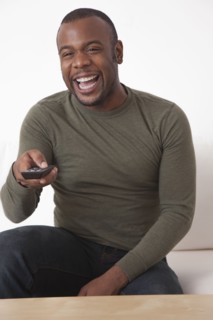 Black man using remote control
