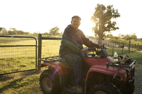 Caucasian man riding leisure vehicle