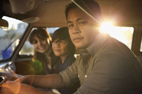 Family riding in van together