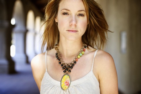 Caucasian woman wearing necklace