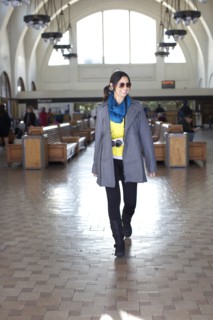 Mixed race woman walking in historic building