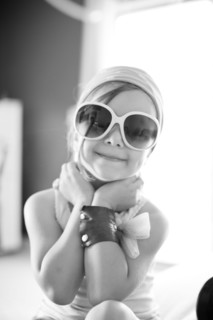 Mixed race girl wearing sunglasses