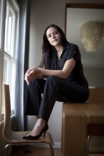 Caucasian businesswoman sitting in table