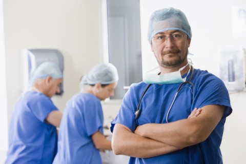 Surgeons scrubbing in before operating
