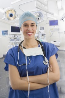 Mixed race surgeon in operating room