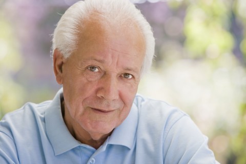 Serious senior Hispanic man