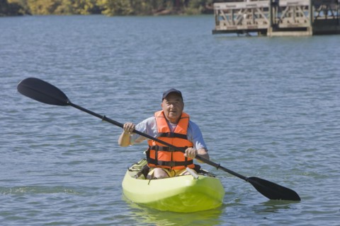 Chilean man paddling kayak