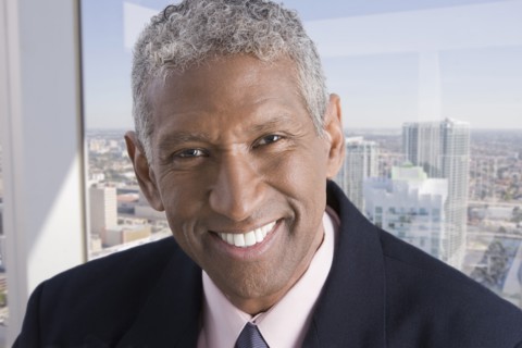 Smiling mixed race businessman