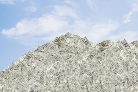 Illustration of mountain of dollar bills