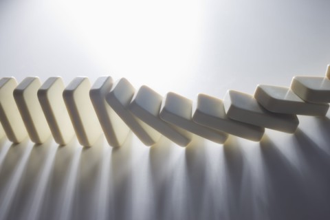 Close up of falling dominoes