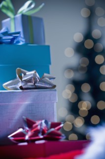 Stacks of wrapped Christmas gifts