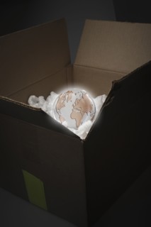 Glowing globe in delivery box
