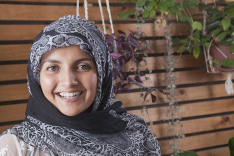 Hispanic woman wearing headscarf