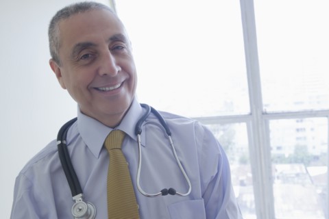 Smiling Hispanic doctor