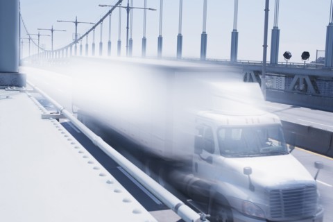 Semi-truck speeding on bridge