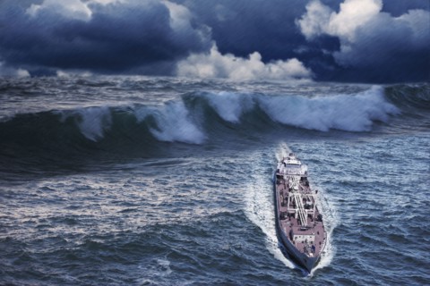 Enormous waves behind freighter
