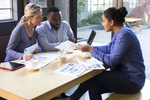 Business people talking in office meeting
