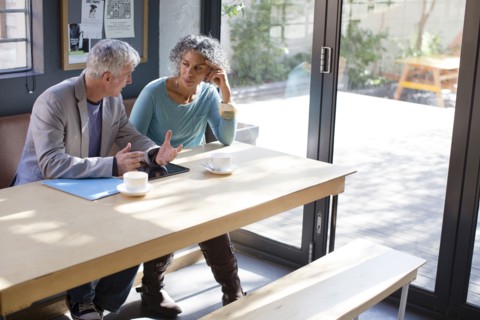 Business people talking in office meeting