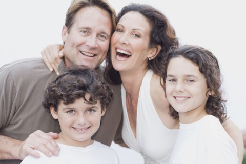 Happy family posing for portrait