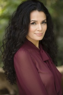 Hispanic woman smiling outdoors