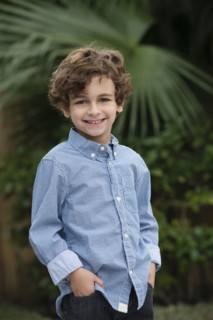 Mixed race boy smiling outdoors