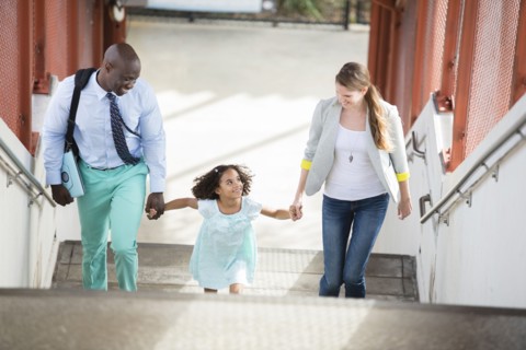 Family walking up stairs