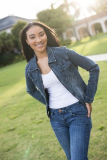 Black woman walking on lawn