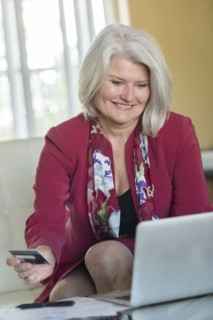 Caucasian older woman shopping online