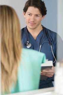 Doctor listening to patient