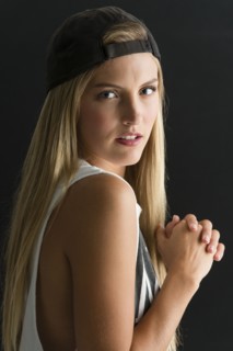 Serious Caucasian woman looking over her shoulder