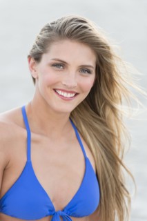 Caucasian woman wearing bikini on beach