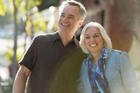 Older Caucasian couple walking outdoors