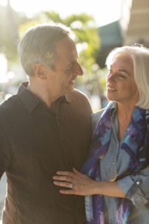 Older Caucasian couple walking outdoors