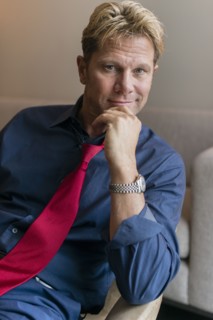 Caucasian businessman sitting in office lobby