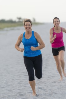Women running on beach