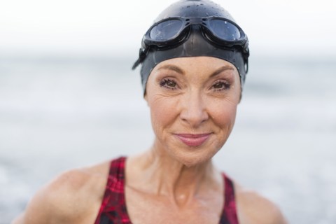 Caucasian swimmer smiling