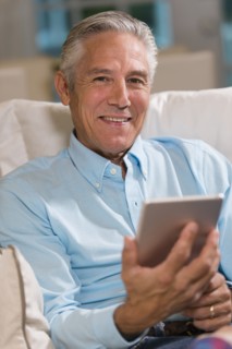 Caucasian businessman using digital tablet