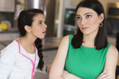 Mother and daughter arguing in kitchen