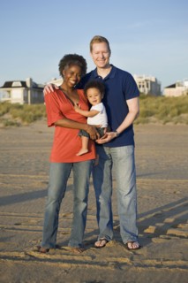 Multi-ethnic family enjoying beach