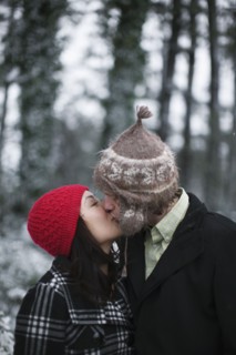 Couple kissing outdoors