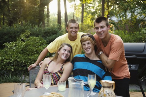 Friends hanging out together drinking lemonade