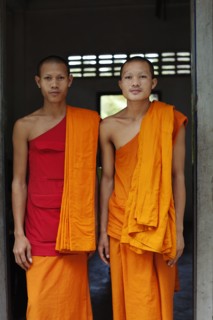 Cambodian monks standing in doorway