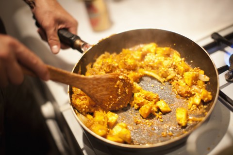 Close up of person making pad thai