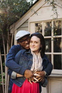 Husband hugging pregnant wife