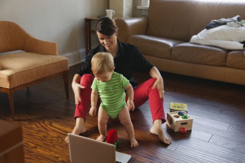 Caucasian mother playing with toddler
