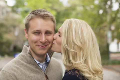 Caucasian couple kissing outdoors