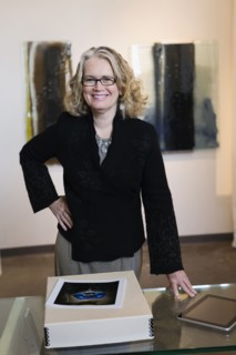 Caucasian woman working in art gallery