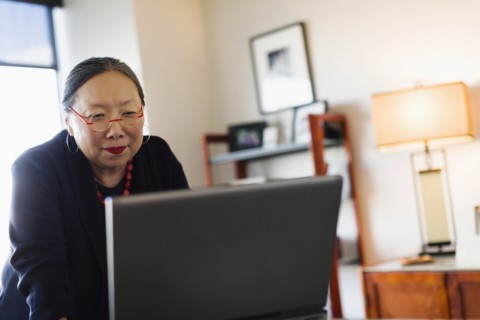 Japanese businesswoman working at desk