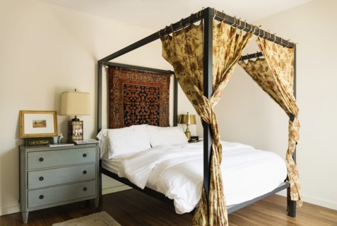 Canopy bed in bedroom